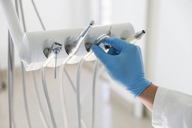 Professional Tooth Extraction technician working in New Castle, IN